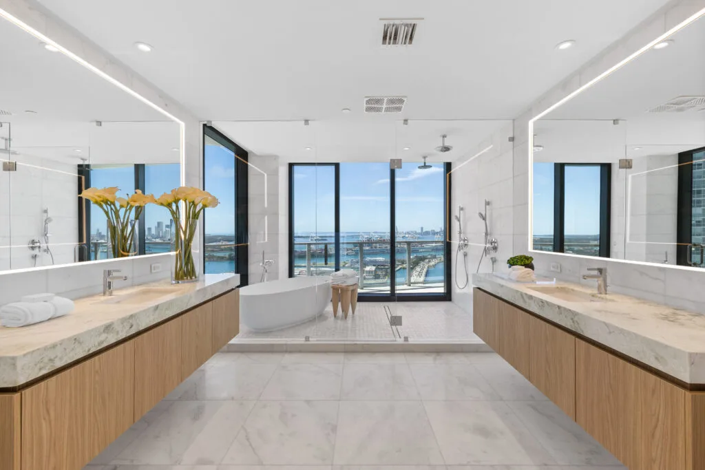 The luxurious en-suite bedrooms offer spa-like bathrooms adorned with high-end fixtures.
