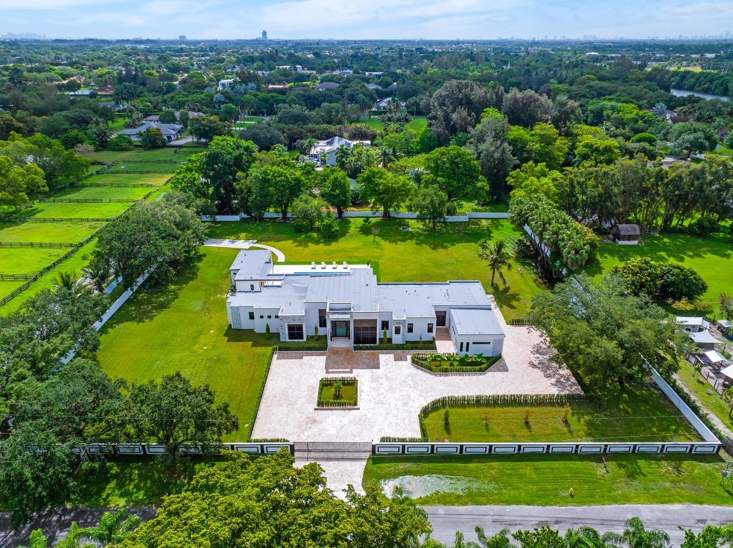Drone aerial view of a Cooper City luxury estate and grounds