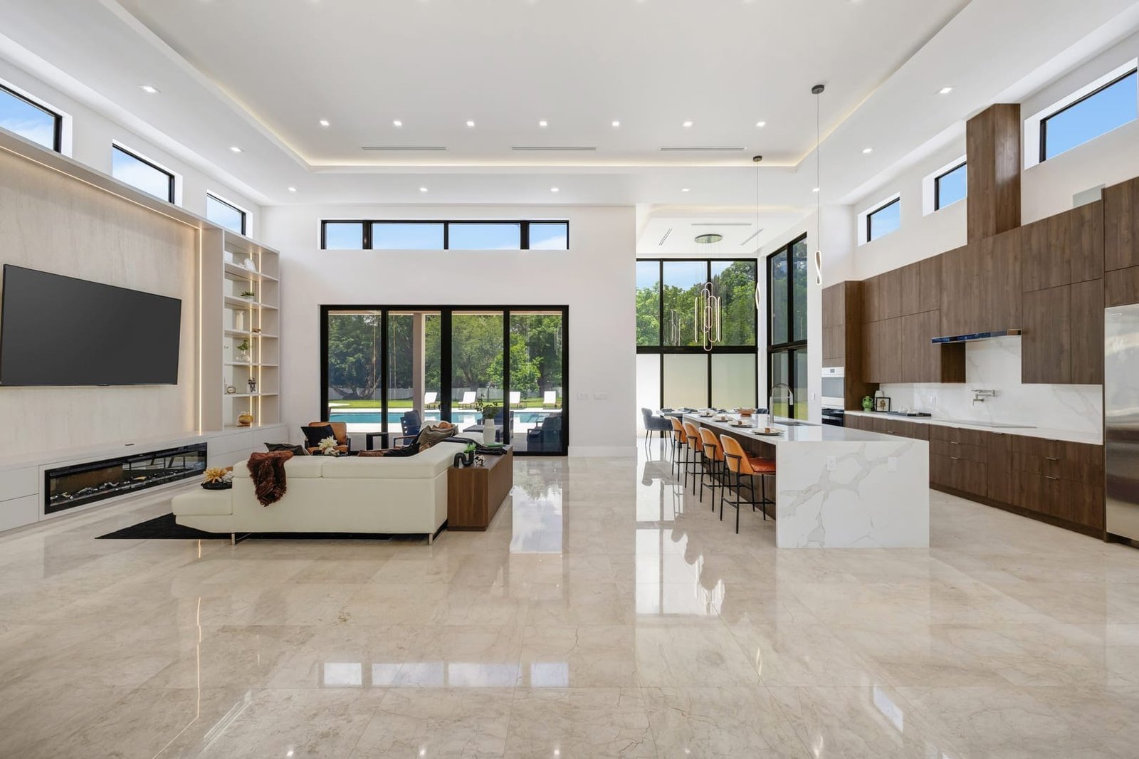 Interior lounge and kitchen view inside a Cooper City luxury estate