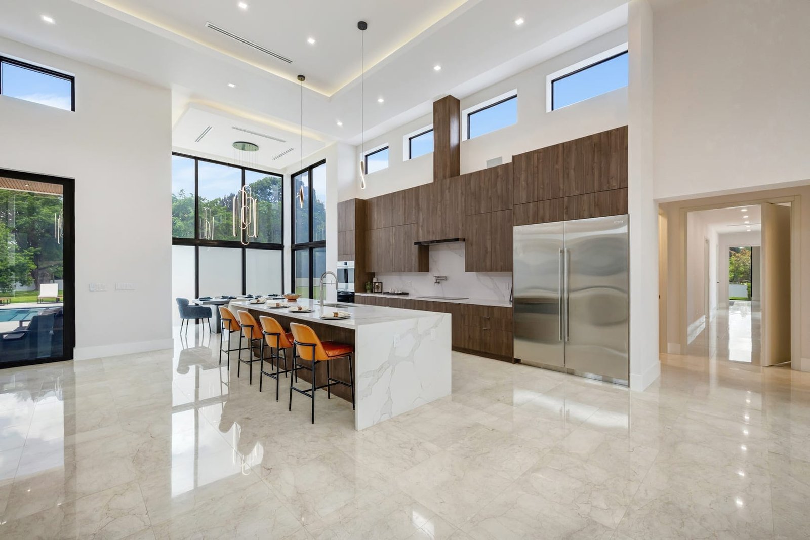 Modern kitchen with island inside a Cooper City luxury estate